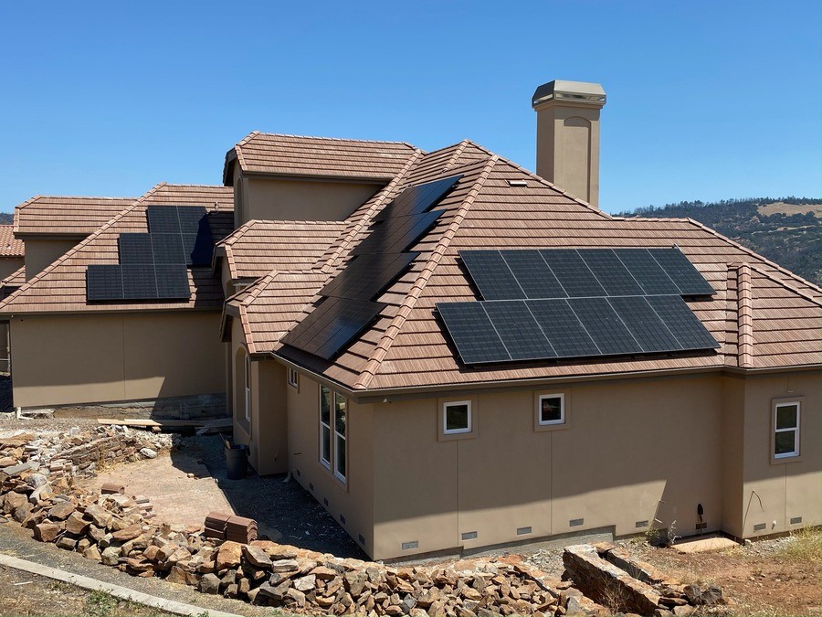 A home with solar panels on the roof.