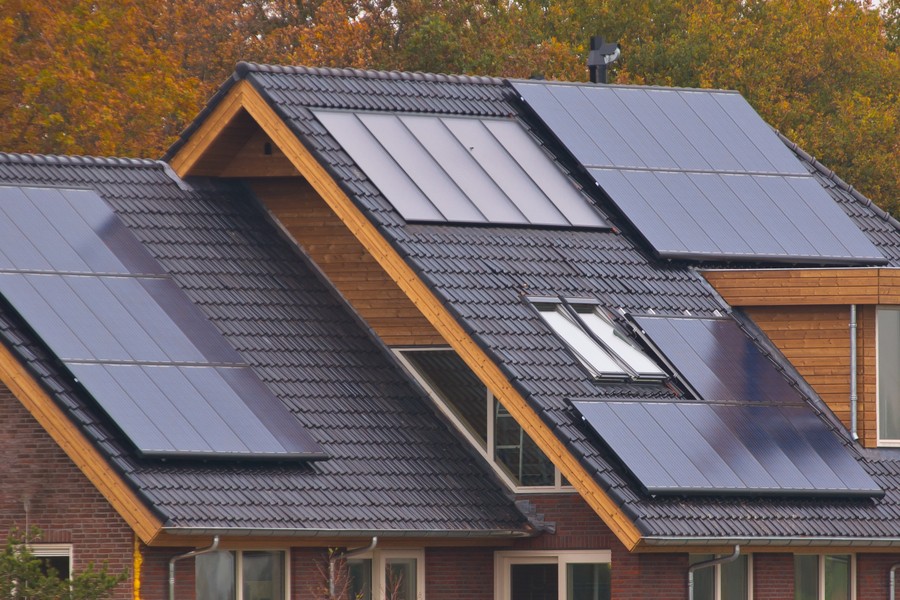 A home with solar panels on the roof.