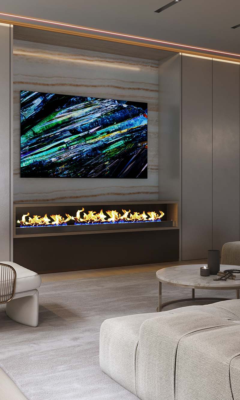 sony tv in a luxury home with a fireplace beneath
