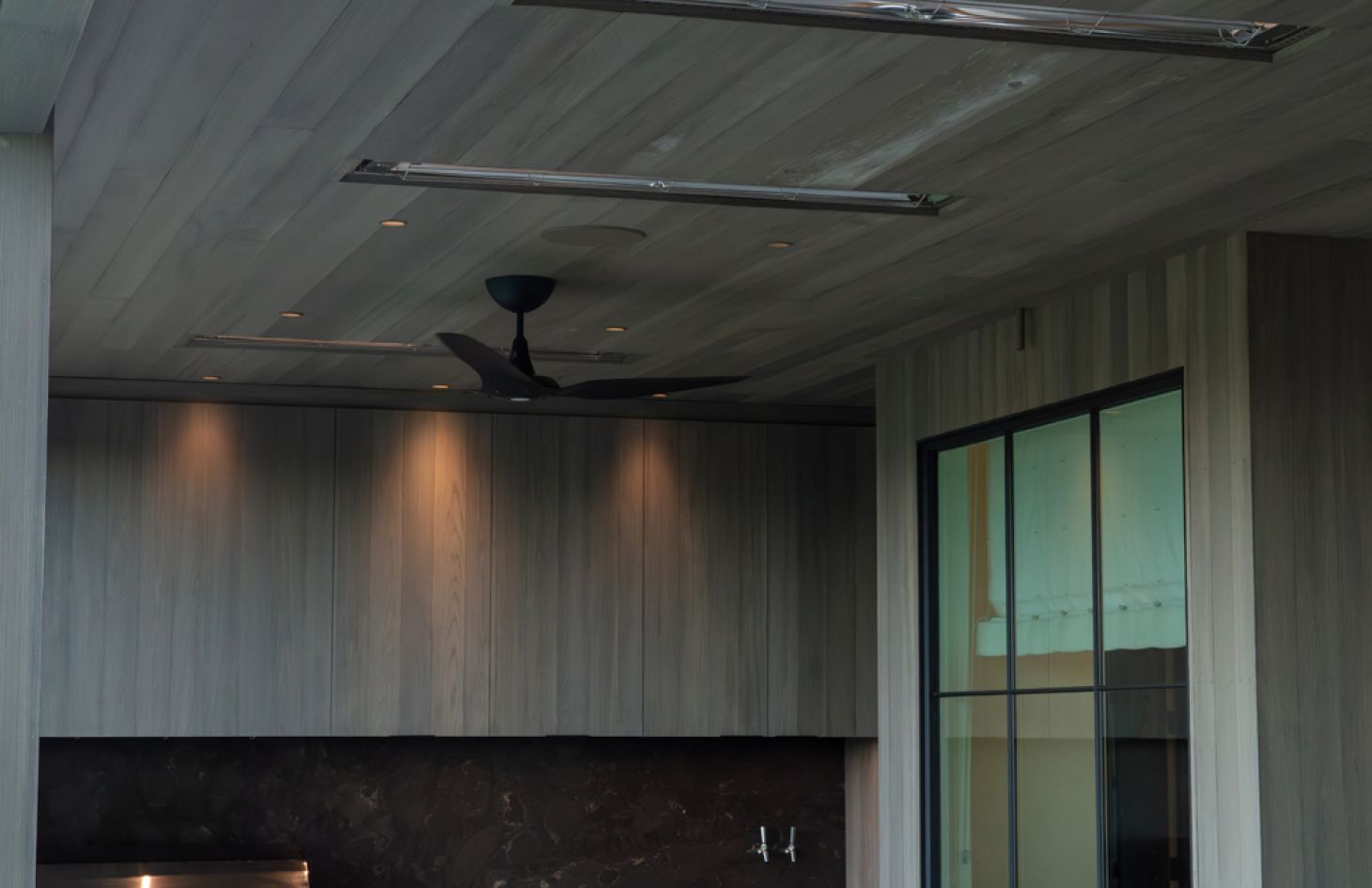 A stylish interior scene with high-end furnishings, artistic decor elements, and a balanced mix of natural and ambient light creating a refined atmosphere.